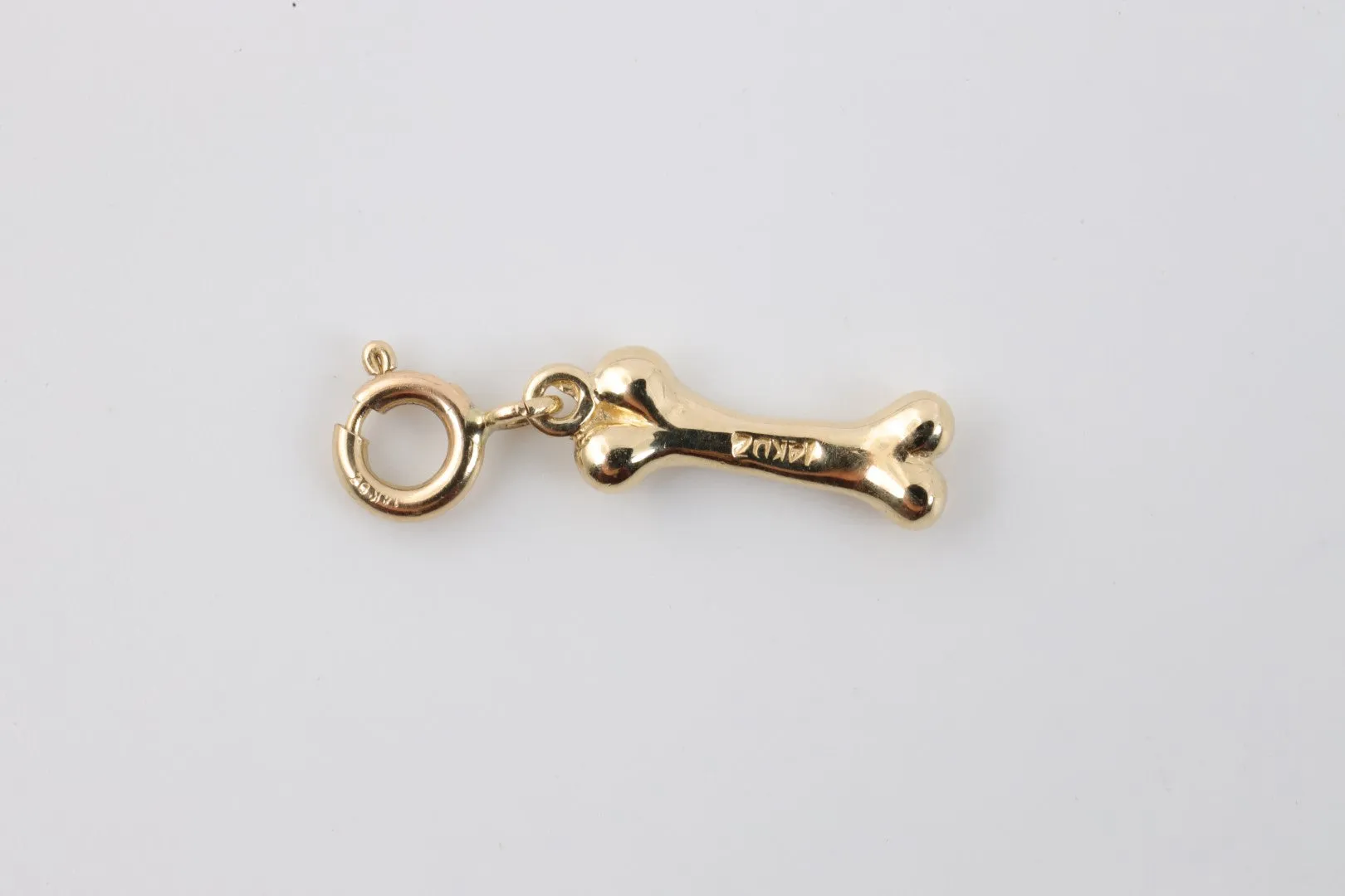 14k Yellow Gold Bone Charm (1.50g.)