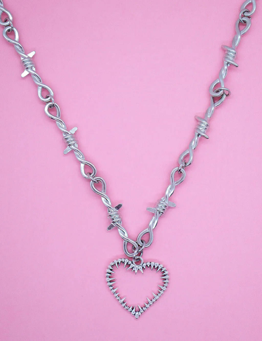 HEART IN A CAGE CHAIN NECKLACE